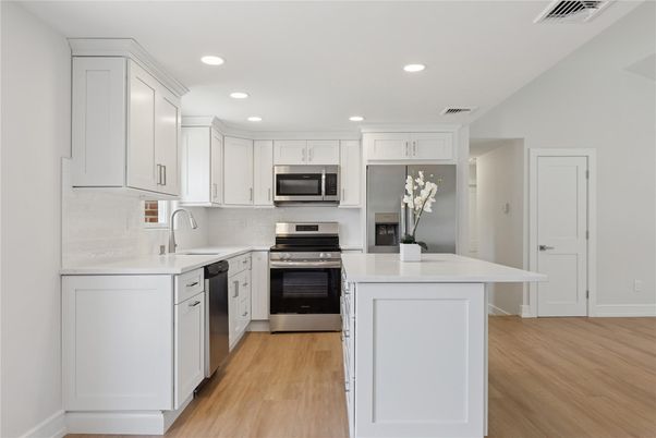 Interior, Kitchen, Recessed Lighting, Stainless Steel Appliances, Wood Texture Flooring