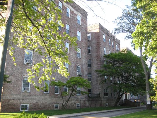 Exterior, Facade, Brick Facade, Condo Building