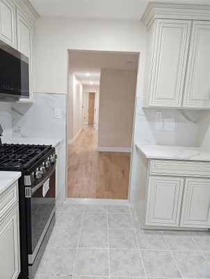 Interior, Kitchen, Marble Walls, Recessed Lighting, Wood Texture Flooring