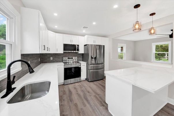 Interior, Kitchen, Pendant Lights, Recessed Lighting, Stainless Steel Appliances, Wood Texture Flooring