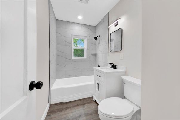 Bathroom, Interior, Marble Walls, Recessed Lighting, Wood Texture Flooring