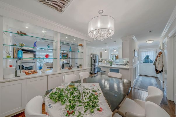 Chandelier, Dining room, Interior, Kitchen, Recessed Lighting, Stainless Steel Appliances, Wood Texture Flooring