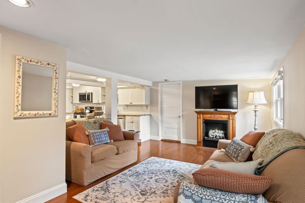 Fireplace, Interior, Kitchen, Living room, Recessed Lighting, Stainless Steel Appliances, Wood Texture Flooring