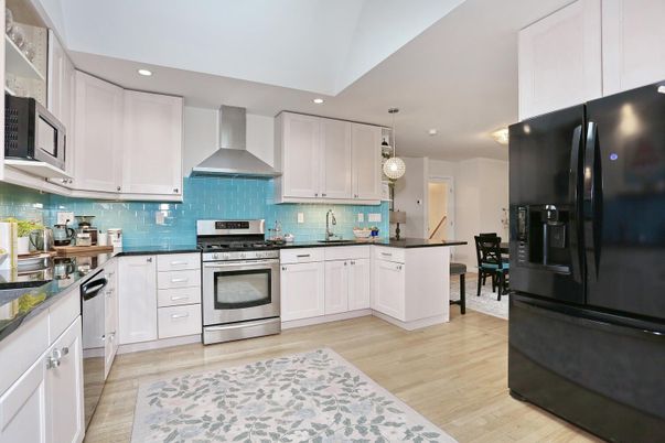 Dining room, Interior, Kitchen, Pendant Lights, Recessed Lighting, Stainless Steel Appliances, Wood Texture Flooring