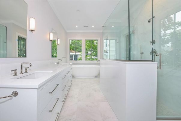 Bathroom, Dual Sink Vanities, Free Standing Baths, Glass Shower, Interior, Marble, Marble Walls, Recessed Lighting