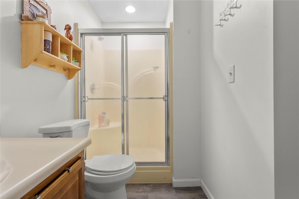 Bathroom, Glass Shower, Interior, Recessed Lighting, Wood Texture Flooring
