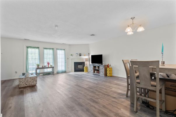 Dining room, Fireplace, Interior, Pendant Lights, Wood Texture Flooring