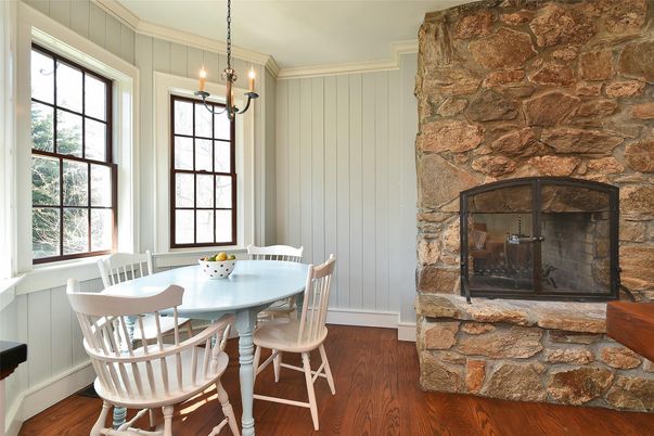Dining room, Fireplace, Interior, Pendant Lights, Stone Walls, Wood Texture Flooring