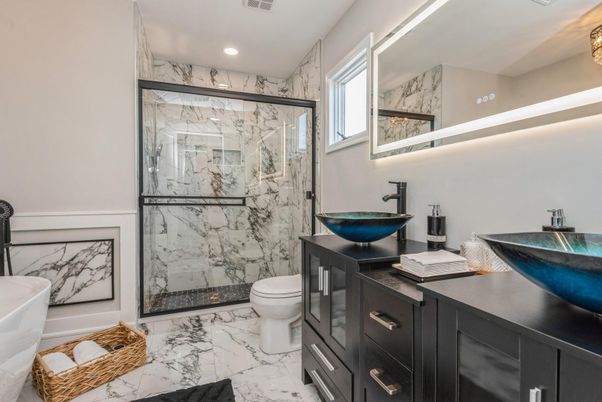 Bathroom, Dual Sink Vanities, Glass Shower, Interior, Marble, Marble Walls, Recessed Lighting