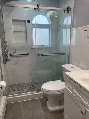 Bathroom, Glass Shower, Interior, Marble Walls, Wood Texture Flooring