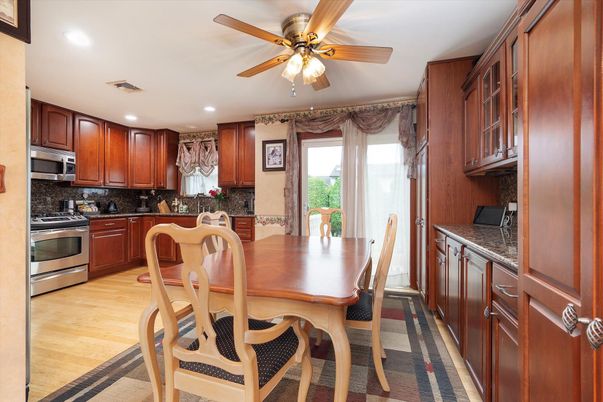 Dining room, Interior, Kitchen, Recessed Lighting, Stainless Steel Appliances, Wood Texture Flooring