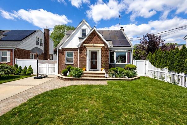 Backyard, Exterior, Facade, Brick Facade, Solar Panels, Tudor Revival