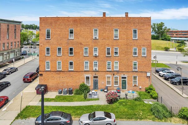 Exterior, Facade, Brick Facade, Condo Building