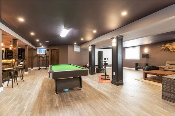 Billiard Table, Fitness Equipment, Game Room, Interior, Pendant Lights, Recessed Lighting, Wood Texture Flooring