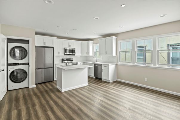 Interior, Kitchen, Recessed Lighting, Stainless Steel Appliances, Washer, Wood Texture Flooring