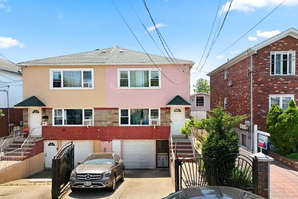 Attached, Exterior, Facade, Brick Facade, American Foursquare