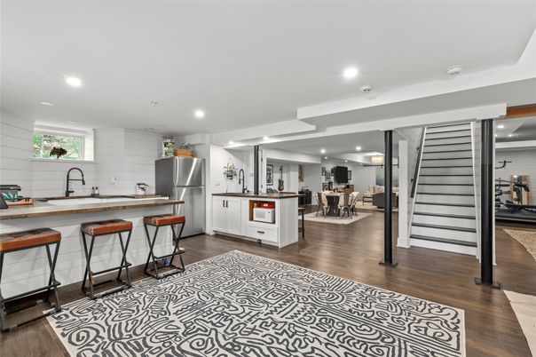 Dining room, Interior, Kitchen, Recessed Lighting, Stainless Steel Appliances, Wood Texture Flooring