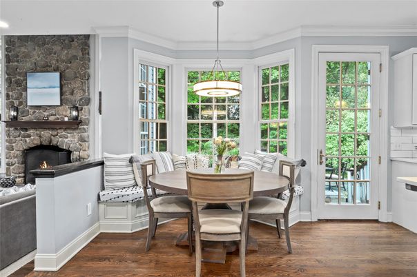 Dining room, Fireplace, Interior, Pendant Lights, Recessed Lighting, Stone Walls, Wood Texture Flooring