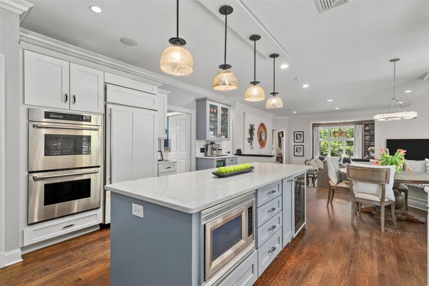 Dining room, Interior, Kitchen, Pendant Lights, Recessed Lighting, Stainless Steel Appliances, Wood Texture Flooring