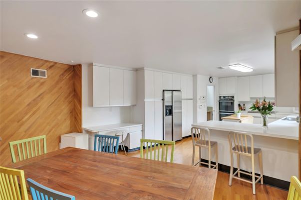 Dining room, Interior, Kitchen, Recessed Lighting, Stainless Steel Appliances, Wood Texture Flooring