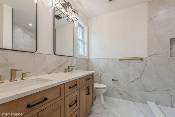 Bathroom, Dual Sink Vanities, Interior, Marble, Marble Walls, Recessed Lighting