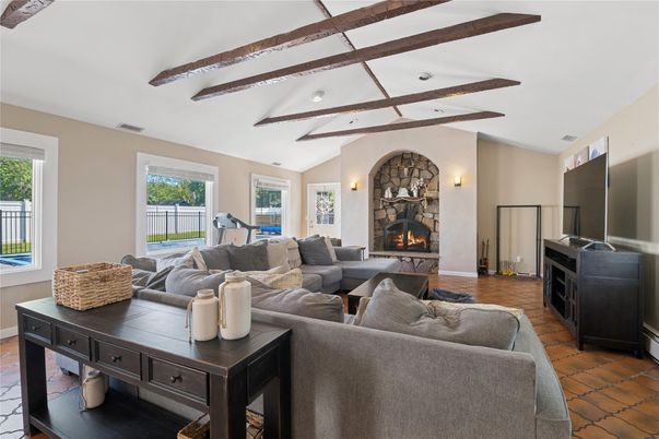 Fireplace, Fitness Equipment, Interior, Living room, Recessed Lighting, Wooden Beams