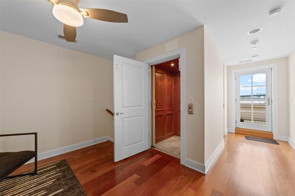 Elevator, Interior, Recessed Lighting, Wood Texture Flooring, Wooden Walls