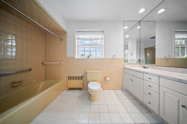 Bathroom, Dual Sink Vanities, Interior, Recessed Lighting, Tile Countertops