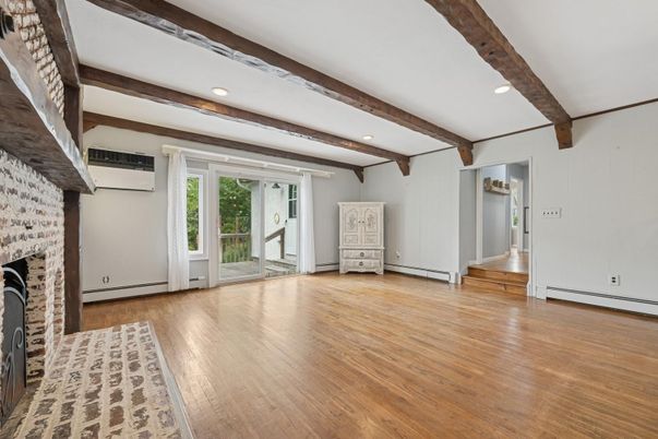 Empty room, Fireplace, Interior, Recessed Lighting, Wooden Beams, Wood Texture Flooring