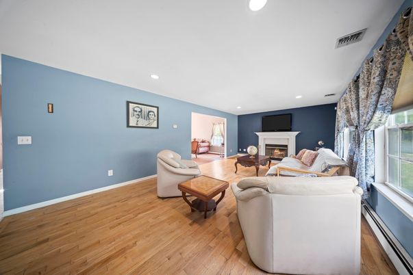 Fireplace, Interior, Living room, Recessed Lighting, Wood Texture Flooring