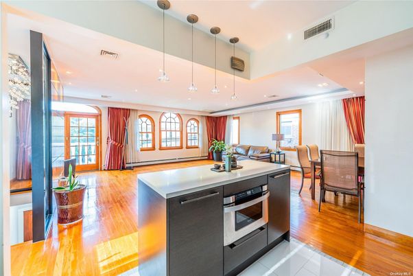 Dining room, Interior, Kitchen, Pendant Lights, Recessed Lighting, Stainless Steel Appliances, Wood Texture Flooring