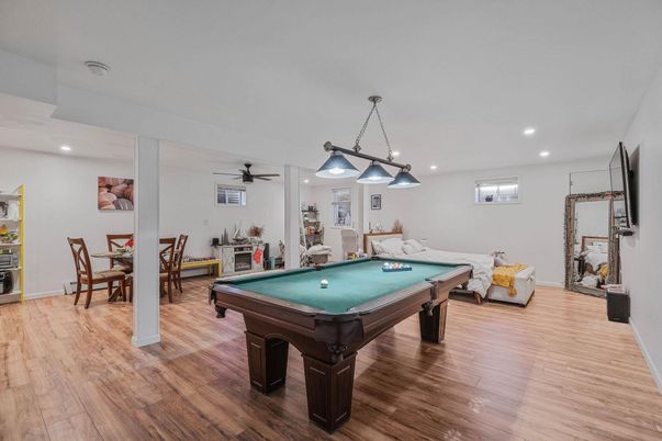 Billiard Table, Chandelier, Dining room, Game Room, Interior, Pendant Lights, Recessed Lighting, Wood Texture Flooring