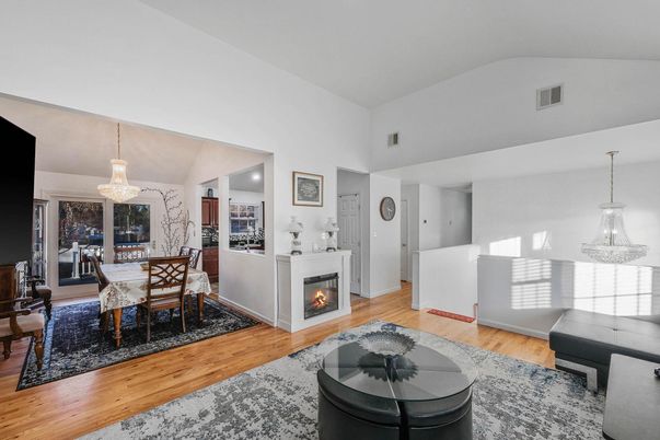 Chandelier, Dining room, Fireplace, Interior, Pendant Lights, Wood Texture Flooring