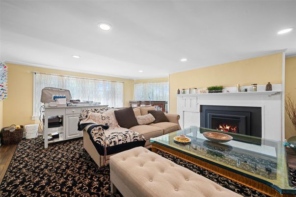 Fireplace, Interior, Living room, Recessed Lighting, Wood Texture Flooring