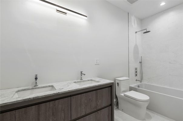 Bathroom, Dual Sink Vanities, Interior, Marble Walls, Recessed Lighting