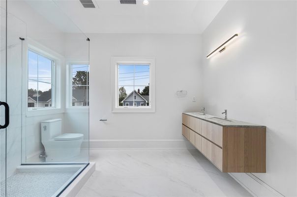 Bathroom, Dual Sink Vanities, Glass Shower, Interior, Marble, Recessed Lighting