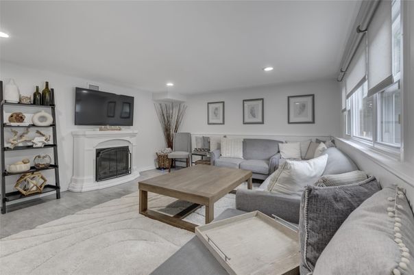 Fireplace, Interior, Living room, Recessed Lighting, Wood Texture Flooring