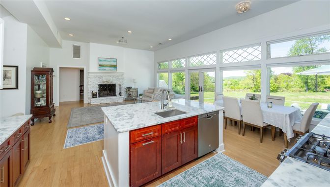Dining room, Fireplace, Interior, Kitchen, Recessed Lighting, Wood Texture Flooring
