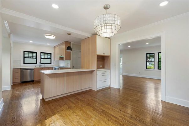 Chandelier, Interior, Kitchen, Pendant Lights, Recessed Lighting, Stainless Steel Appliances, Wood Texture Flooring