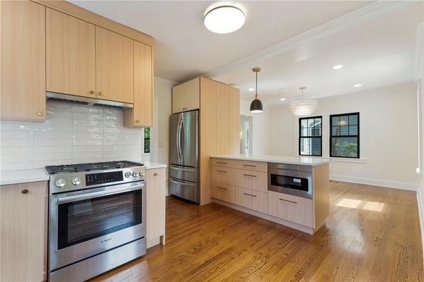 Chandelier, Interior, Kitchen, Pendant Lights, Recessed Lighting, Stainless Steel Appliances, Wood Texture Flooring