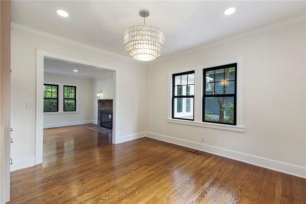 Chandelier, Empty room, Fireplace, Interior, Recessed Lighting, Wood Texture Flooring