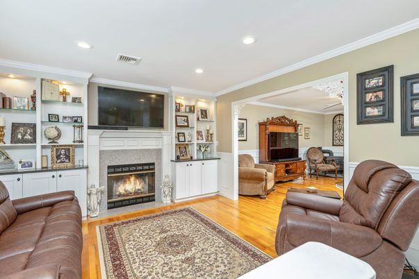 Fireplace, Interior, Living room, Recessed Lighting, Wood Texture Flooring