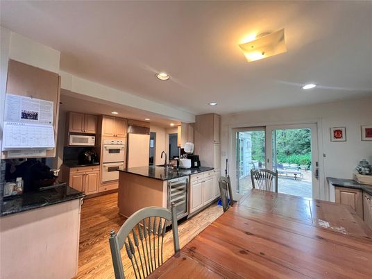 Dining room, Interior, Kitchen, Recessed Lighting, Stainless Steel Appliances, Wood Texture Flooring