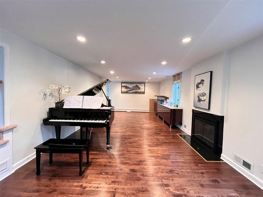 Fireplace, Interior, Piano, Recessed Lighting, Wood Texture Flooring