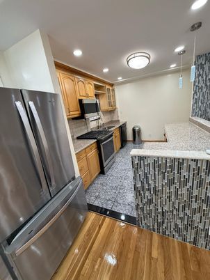 Interior, Kitchen, Recessed Lighting, Stainless Steel Appliances, Wood Texture Flooring