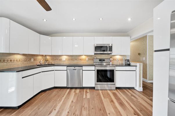 Interior, Kitchen, Recessed Lighting, Stainless Steel Appliances, Wood Texture Flooring