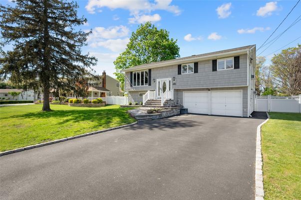 Attached, Exterior, Facade, Raised Ranch