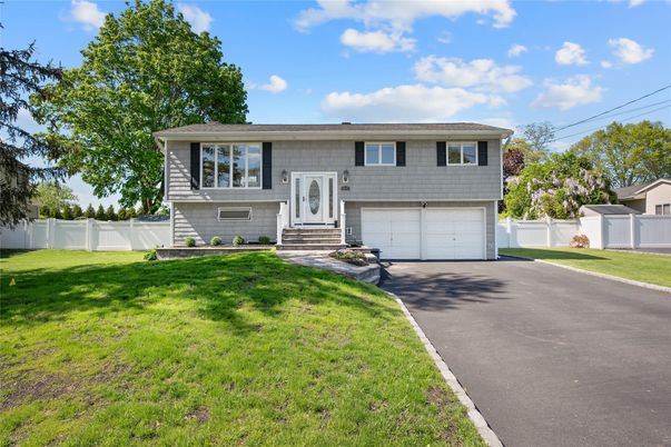 Attached, Exterior, Facade, Raised Ranch
