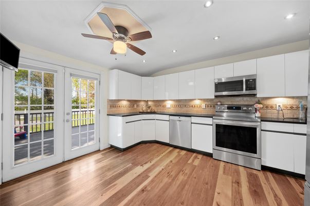Interior, Kitchen, Recessed Lighting, Stainless Steel Appliances, Wood Texture Flooring