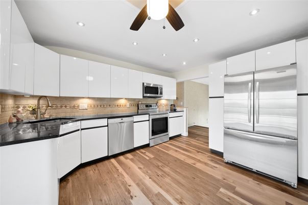 Interior, Kitchen, Recessed Lighting, Stainless Steel Appliances, Wood Texture Flooring